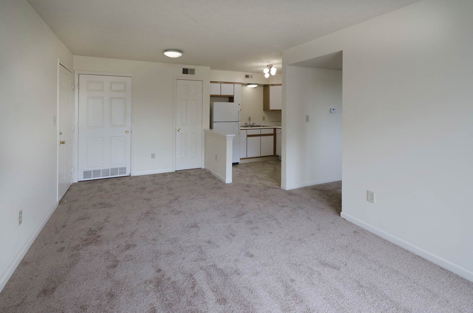 Carpeted Living Space at Bradford Place Apartments, Lafayette, IN