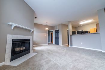 Living Room With Kitchen View at The Reserve at Williams Glen, Zionsville, IN, 46077