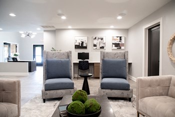 Resident seating in clubhouse Resident seating in clubhouse at Governor Square Apartments, Carmel, IN - Photo Gallery 2