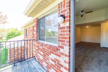 View from balcony into living room at Bradford Run in Kokomo, IN