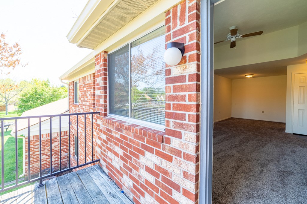 view into living room from balcony at Bradford Run in Kokomo, IN