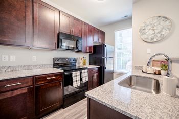 Wooden cabinets at Providence at Old Meridian Apartments , Carmel, IN, 46032