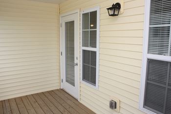 back patio with siding in apartment 