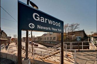 a blue sign that reads garwood new york