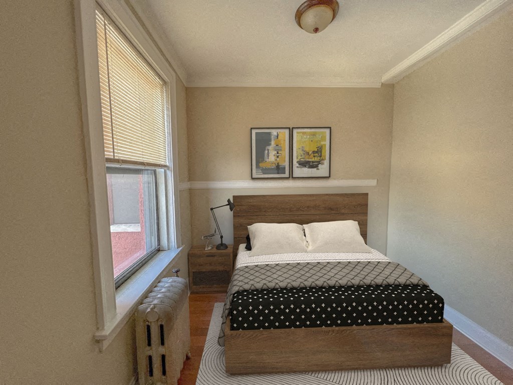 a bedroom with a bed and a window