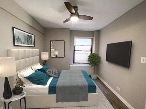 A bedroom with a bed, a ceiling fan, a nightstand, a lamp, a plant, and a television.