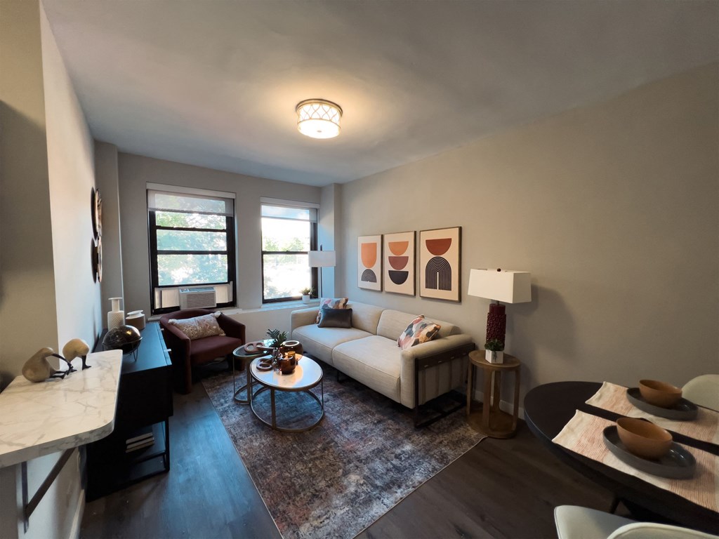 a living room with a couch and a table