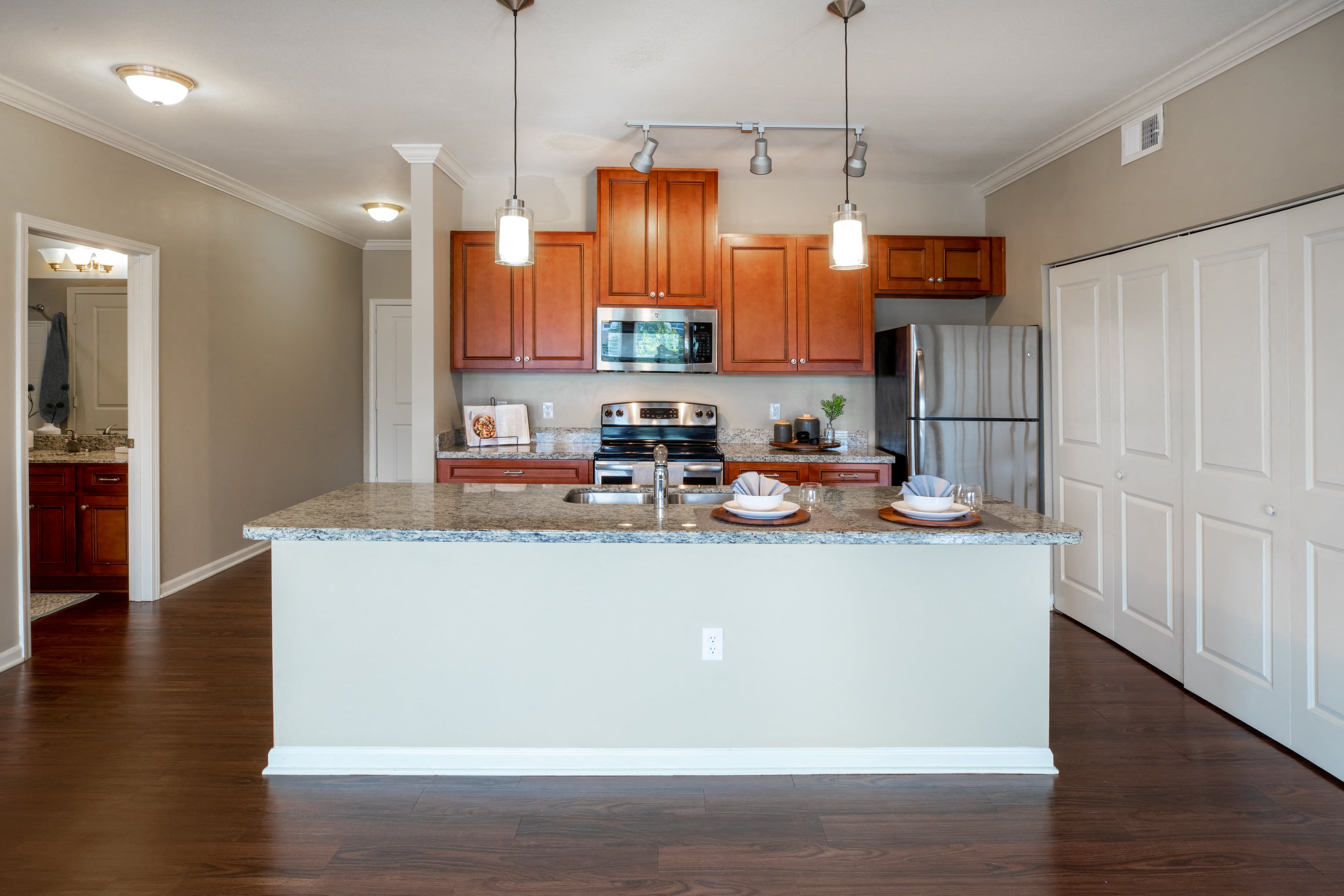 a kitchen with a granite counter top and