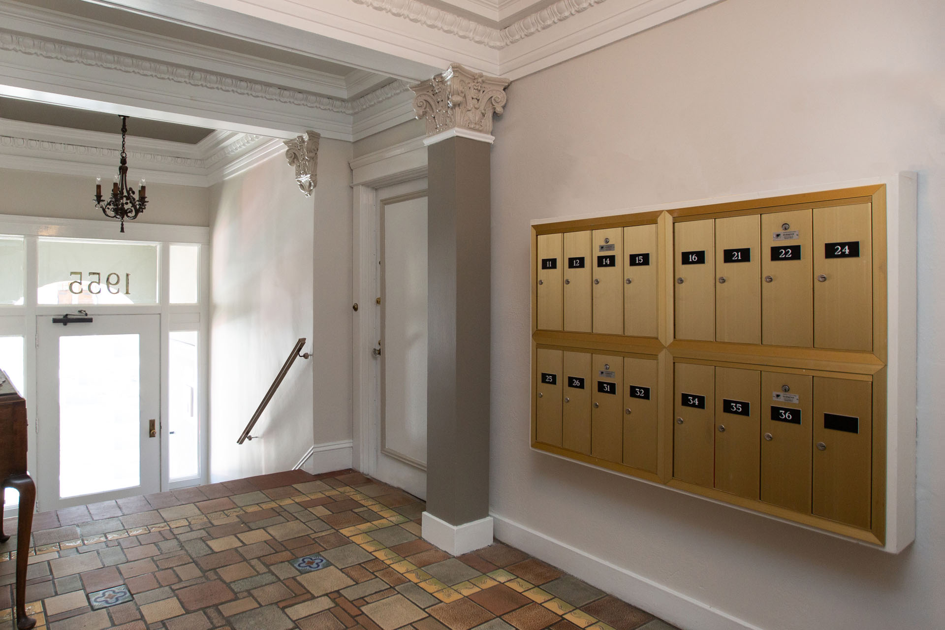 A row of wooden lockers numbered from 1 to 36.