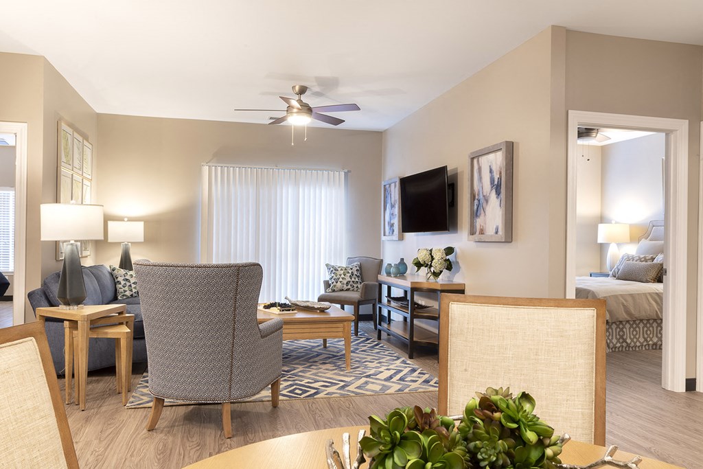 living room with window and ceiling fan at Thirteen01 at Hartman Lakes, Shiloh, IL, 62269