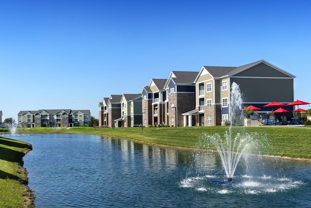 lake with fountain and building in background at Thirteen01 at Hartman Lakes, Shiloh, Illinois