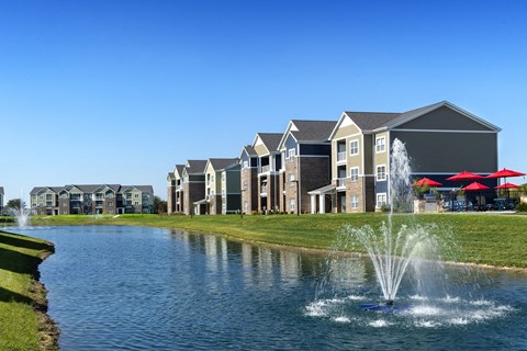 lake with fountain and building in background at Thirteen01 at Hartman Lakes, Shiloh, Illinois