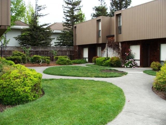 a walkway in front of a building