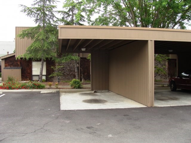 a car parked in front of a garage