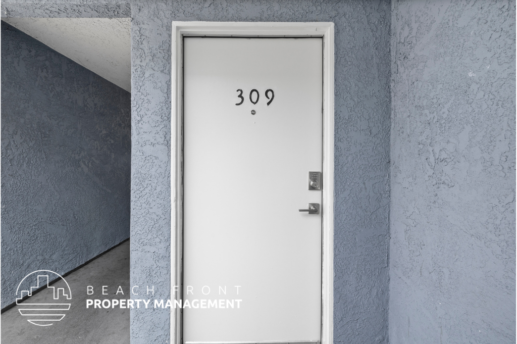 a white door with the number 3099 on it