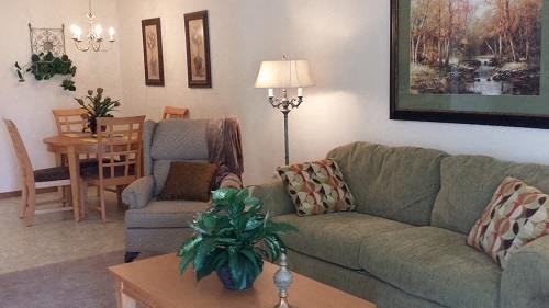 a living room with a couch and a table