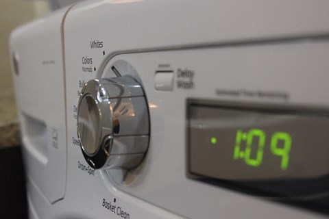 a close up of a microwave oven with the time on it