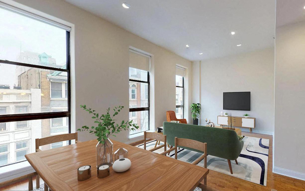 A dining room with a wooden table and chairs.