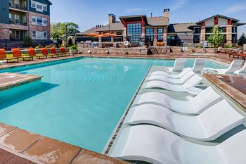 In water lounge chairs at Windsor at Pinehurst, Lakewood, CO