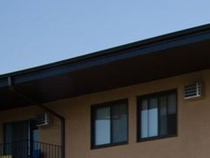 Gazebo by the pool at Equinox Apartments