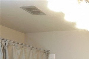 Large bathroom with tile flooring at Equinox Apartments