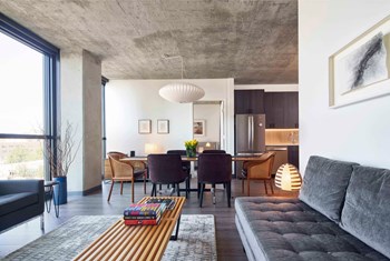 living space with dining area in an apartment home at The Mason - Photo Gallery 5