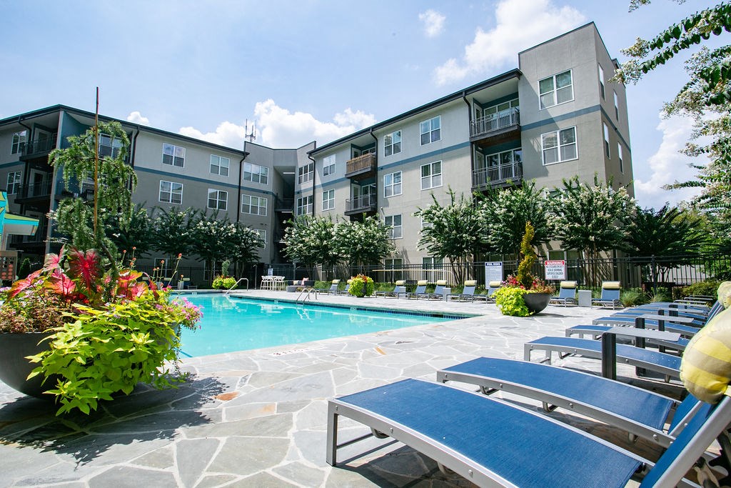 our apartments have a large pool and lounge chairs