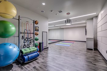 O2 Apartments Fitness Center Yoga Area - Photo Gallery 4