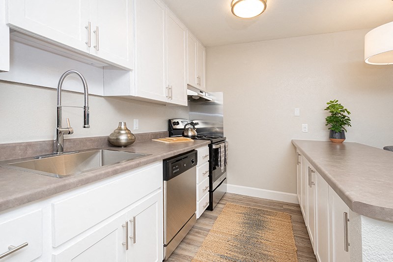 Pleasant Hill CA Apartments - Ellinwood - Modern Kitchen with Wood-Style Flooring