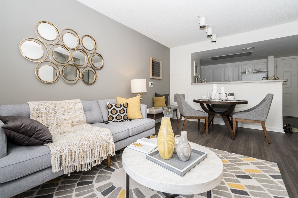 a living room with a couch and a table