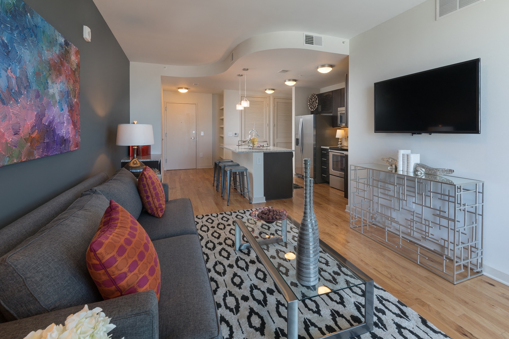 Wood-style floors run throughout each apartment home.