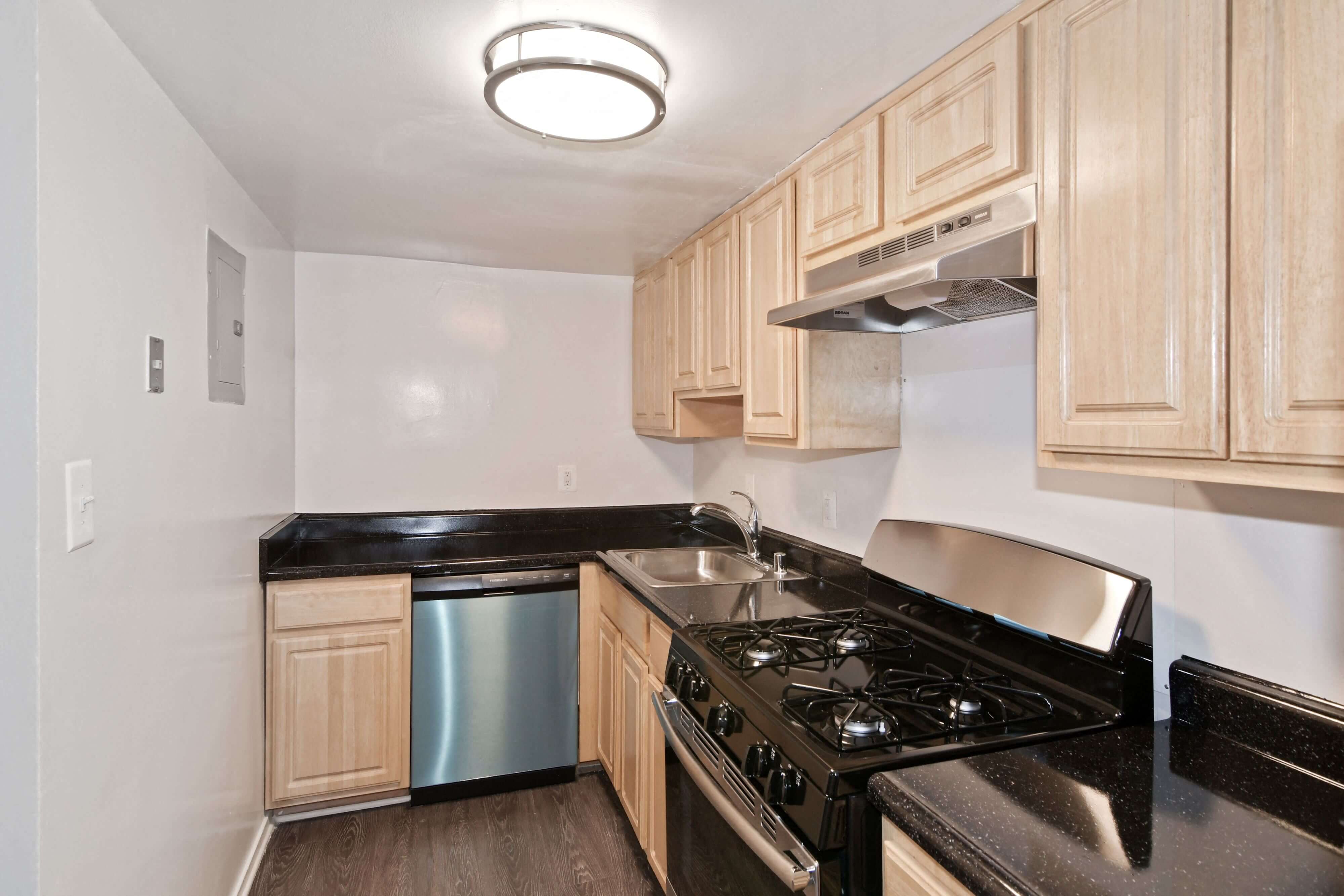 Kitchen with stove and dishwasher