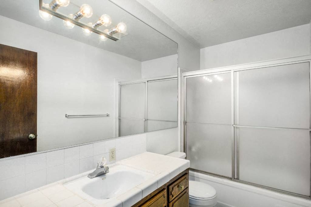 Bathroom With Vanity Lights at Barcelona Apartments, California