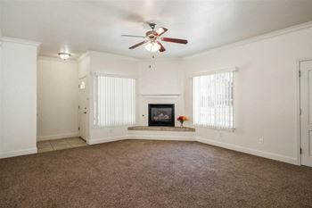 Living Room with Fireplace at Dartmouth Tower at Shaw, Clovis, CA