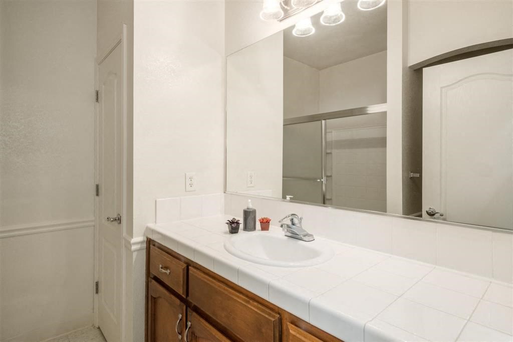 Renovated Bathrooms With Quartz Counters at Dartmouth Tower at Shaw, Clovis, CA, 93612