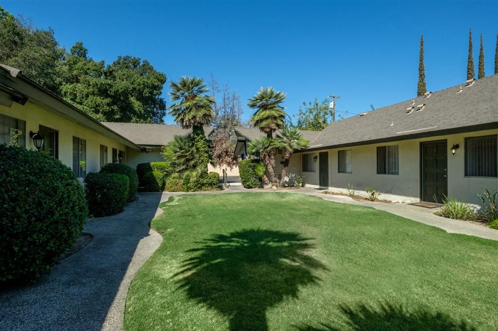 Lush Green Outdoors at Reef Apartments, Fresno