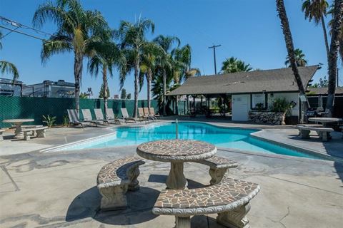 Swimming Pool With Relaxing Sundecks at Reef Apartments, California