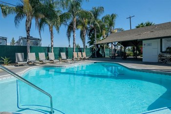 Glimmering Pool Glimmering Pool at Reef Apartments, California, 93704 - Photo Gallery 6