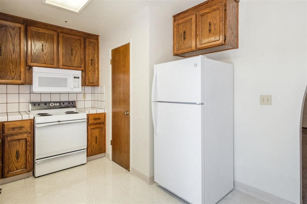 Refrigerator And Kitchen Appliances at Scottsmen Too Apartments, Clovis, California