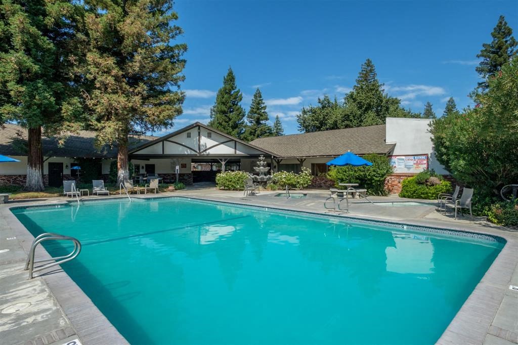 Glimmering Pool at Scottsmen Too Apartments, California, 93612
