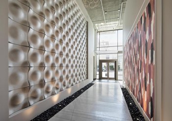 Hallway With Modern Decor at 10th and G Apartments in San Diego, CA