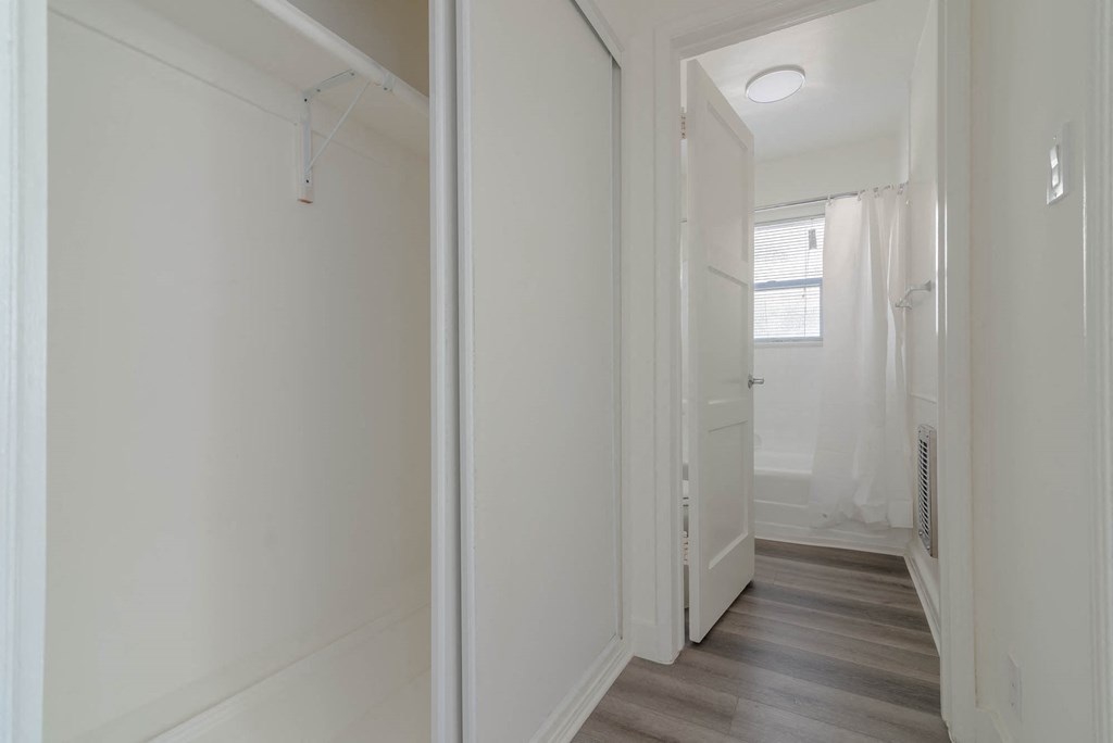 Interior hallway closet view to bathroom