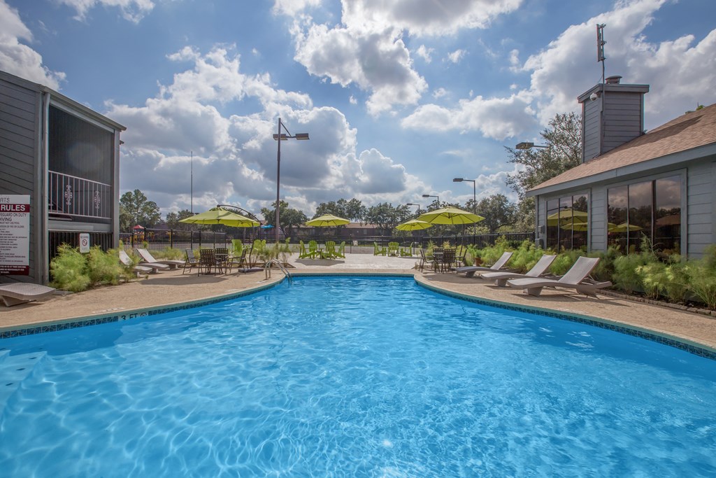 Swimming Pool with Lounge Chairs  at The Quinn at Westchase in Houston, Houston, Texas
