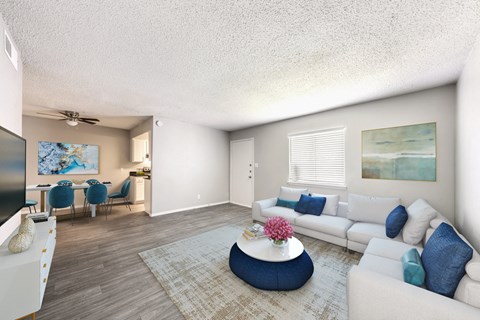 a living room with a couch and a coffee table