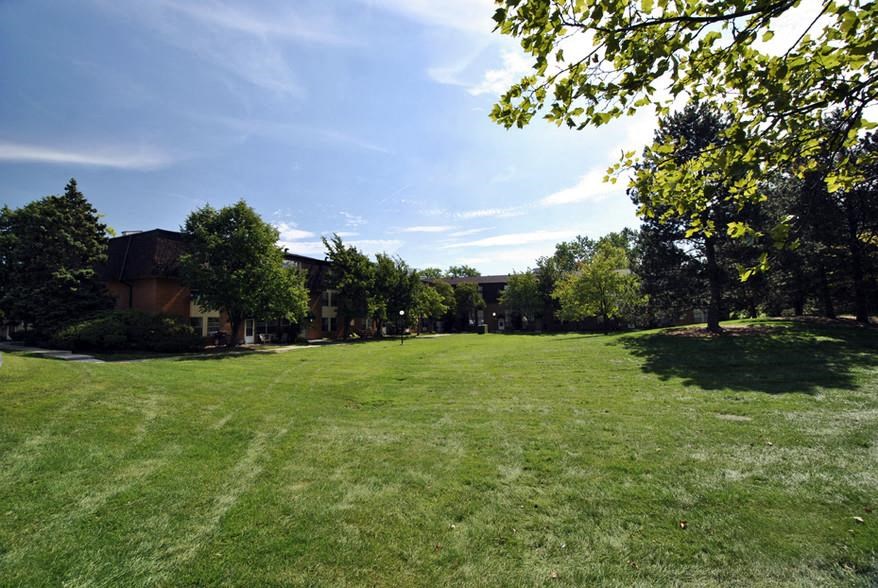 a large lawn in front of a building