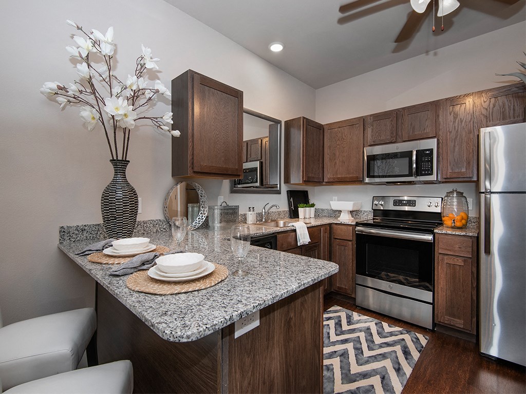 unleash the chef in your kitchen with our appliances and granite countertops