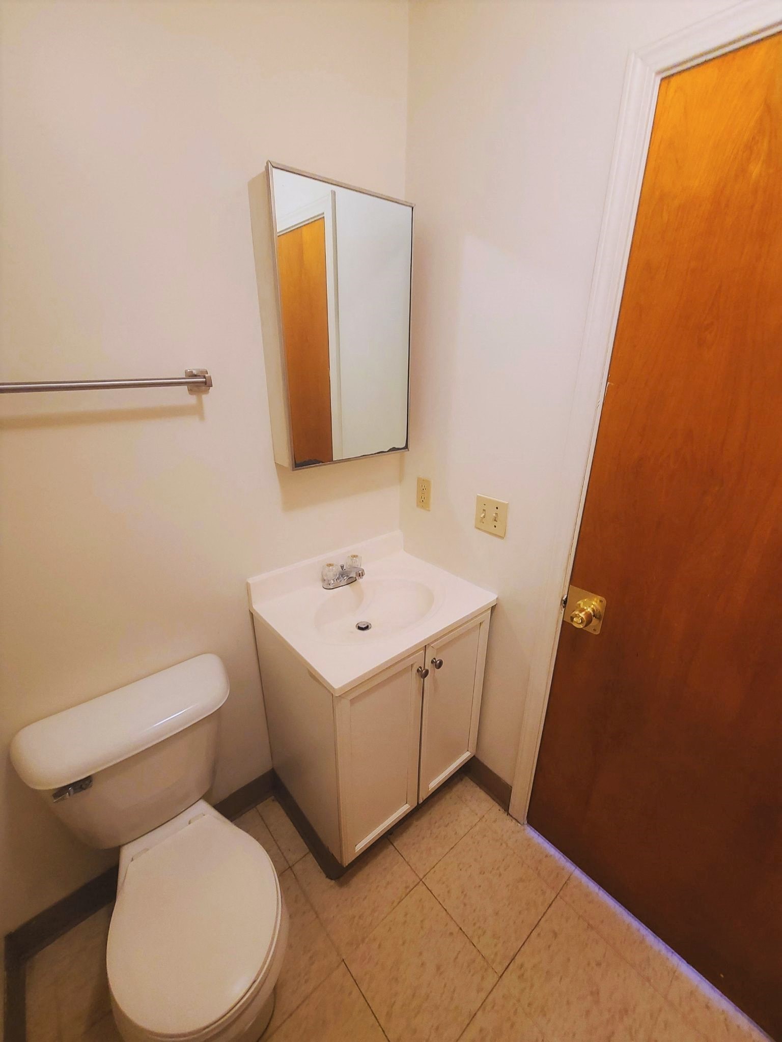 a small bathroom with a toilet and a sink