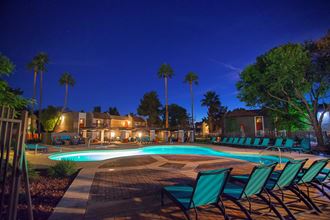 Relaxing Nighttime View of Illuminated Pool