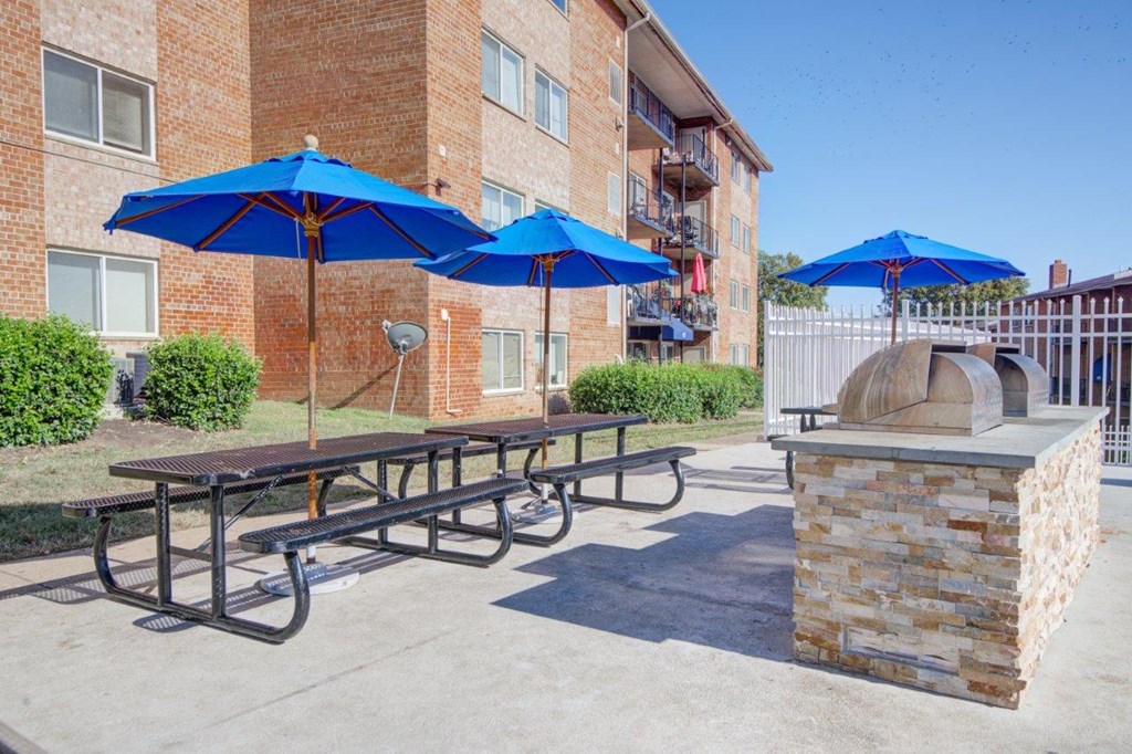 our apartments have a picnic area with umbrellas