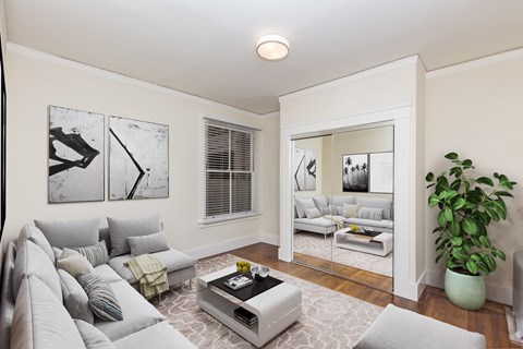 a living room with a couch and a coffee table